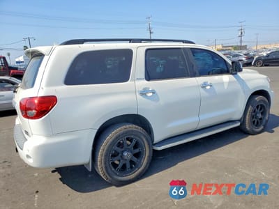 Trzecie zdjęcie samochodu z tyłu: 2013 TOYOTA SEQUOIA PLATINUM VIN:5TDDY5G16DS074466 - miniatura