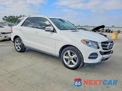 Czwarte zdjęcie samochodu z boku: 2017 MERCEDES-BENZ GLE 350 VIN:4JGDA5JB1HA977354 - miniatura