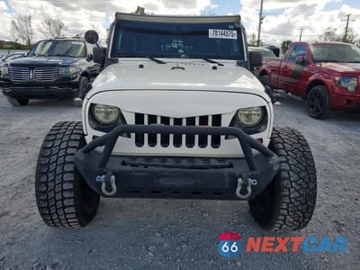 Piąte zdjęcie samochodu w środku: 2009 JEEP WRANGLER UNLIMITED X VIN:1J4GA39139L770935 - miniatura