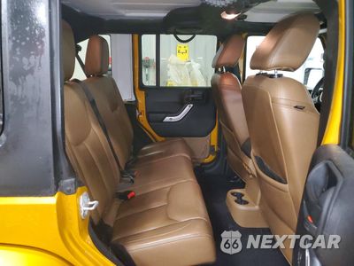 Zdjęcie 11 z 15 samochodu: 2014 JEEP WRANGLER UNLIMITED SAHARA VIN:1C4HJWEG0EL203579 - miniatura