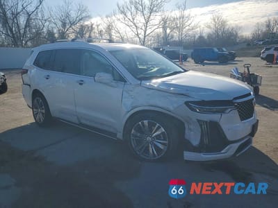 Czwarte zdjęcie samochodu z boku: 2021 CADILLAC XT6 PREMIUM LUXURY VIN:1GYKPDRS4MZ231494 - miniatura