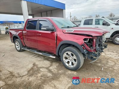 Czwarte zdjęcie samochodu z boku: 2021 RAM 1500 BIG HORN VIN:1C6SRFFT3MN673383 - miniatura