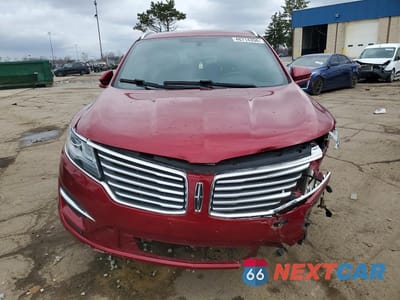 Piąte zdjęcie samochodu w środku: 2015 LINCOLN MKC VIN:5LMCJ1A99FUJ14652 - miniatura