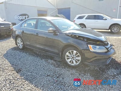 Czwarte zdjęcie samochodu z boku: 2016 VOLKSWAGEN JETTA SE VIN:3VWD67AJ7GM374531 - miniatura