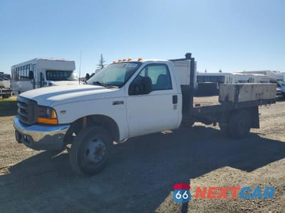 1999 FORD F450 SUPER DUTY FLATBED TRUCK 3FDXF46S3XMA32540 - główne zdjęcie licytacji z USA - miniatura