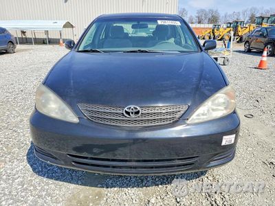 Piąte zdjęcie samochodu w środku: 2004 TOYOTA CAMRY LE VIN:4T1BE32KX4U359117 - miniatura