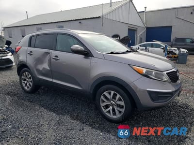 Czwarte zdjęcie samochodu z boku: 2014 KIA SPORTAGE LX VIN:KNDPBCAC0E7587219 - miniatura
