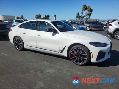 Czwarte zdjęcie samochodu z boku: 2023 BMW I4 M50 VIN:WBY33AW09PFP80295 - miniatura