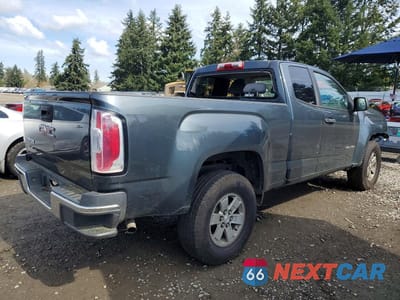 Trzecie zdjęcie samochodu z tyłu: 2015 GMC CANYON VIN:1GTH5AEA3F1236320 - miniatura