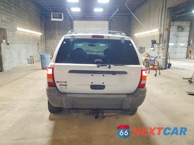 Zdjęcie 6 z 13 samochodu: 2004 JEEP GRAND CHEROKEE LAREDO VIN:1J4GW48S44C378346 - miniatura