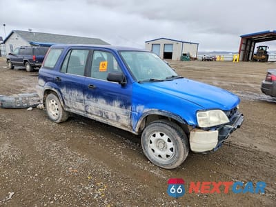 Czwarte zdjęcie samochodu z boku: 1998 HONDA CR-V LX VIN:JHLRD1845WC074386 - miniatura