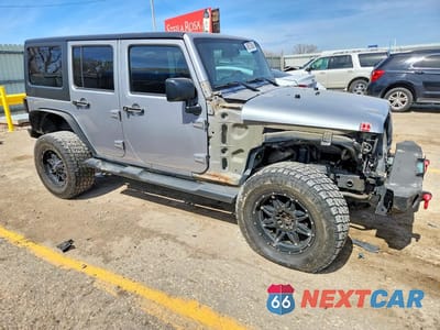 Czwarte zdjęcie samochodu z boku: 2015 JEEP WRANGLER UNLIMITED SAHARA VIN:1C4BJWEG9FL547435 - miniatura