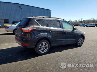 Trzecie zdjęcie samochodu z tyłu: 2018 FORD ESCAPE SE VIN:1FMCU9GD8JUA86811 - miniatura