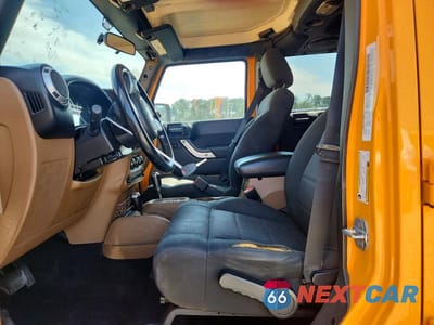 Zdjęcie 7 z 12 samochodu: 2012 JEEP WRANGLER UNLIMITED SAHARA VIN:1C4BJWEGXCL133897 - miniatura