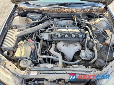 Zdjęcie 11 z 12 samochodu: 1999 HONDA ACCORD LX VIN:JHMCG5640XC052526 - miniatura