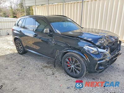 Czwarte zdjęcie samochodu z boku: 2022 BMW X5 M50I VIN:5UXJU4C03N9J80359 - miniatura