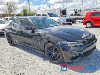 Czwarte zdjęcie samochodu z boku: 2022 BMW 330XI VIN:3MW5R7J02N8C38008 - miniatura