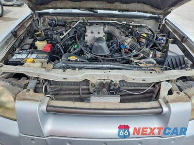 Zdjęcie 11 z 11 samochodu: 2002 NISSAN FRONTIER SC-V6 VIN:1N6MD29X42C309860 - miniatura