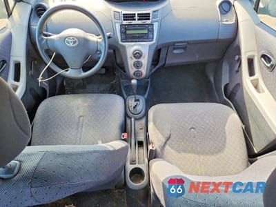 Zdjęcie 8 z 12 samochodu: 2009 TOYOTA YARIS BASE VIN:JTDKT903X95263644 - miniatura