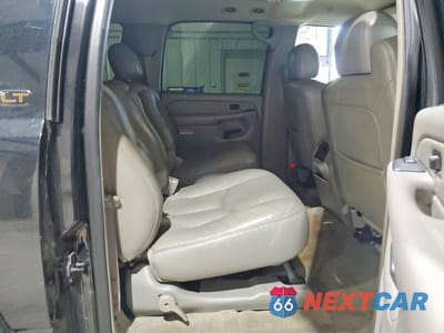 Zdjęcie 11 z 13 samochodu: 2004 CHEVROLET SUBURBAN C1500 VIN:1GNEC16T34J137087 - miniatura