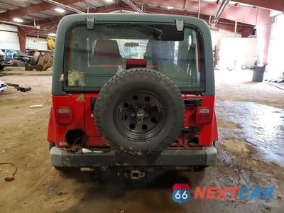 Zdjęcie 6 z 14 samochodu: 2003 JEEP WRANGLER COMMANDO VIN:1J4FA39S63P360778 - miniatura