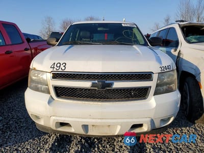 Piąte zdjęcie samochodu w środku: 2010 CHEVROLET SUBURBAN C1500 LS VIN:1GNUCHE07AR100830 - miniatura