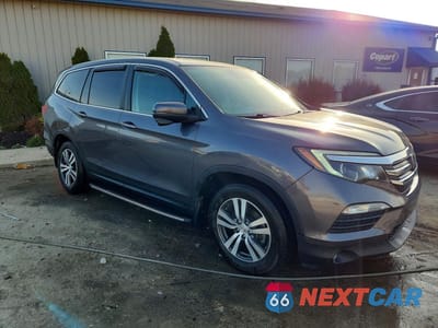 Czwarte zdjęcie samochodu z boku: 2018 HONDA PILOT EXL VIN:5FNYF6H63JB023594 - miniatura