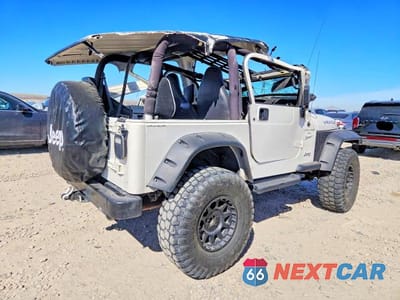 Trzecie zdjęcie samochodu z tyłu: 2001 JEEP WRANGLER / TJ SPORT VIN:1J4FA49S11P300748 - miniatura