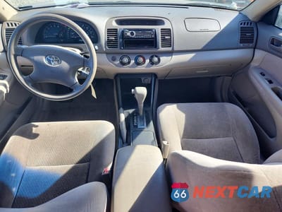 Zdjęcie 8 z 12 samochodu: 2003 TOYOTA CAMRY LE VIN:JTDBE32K630184021 - miniatura