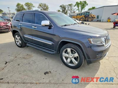 Czwarte zdjęcie samochodu z boku: 2013 JEEP GRAND CHEROKEE LIMITED VIN:1C4RJFBT2DC641122 - miniatura