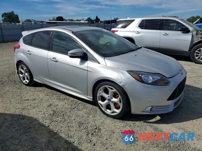Czwarte zdjęcie samochodu z boku: 2013 FORD FOCUS ST VIN:1FADP3L98DL325191 - miniatura