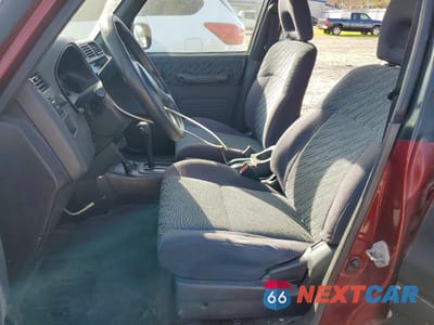 Zdjęcie 7 z 11 samochodu: 2000 TOYOTA RAV4 BASE VIN:JT3GP10V3Y0051035 - miniatura