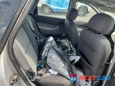 Zdjęcie 10 z 13 samochodu: 2006 FORD FOCUS ZX4 VIN:1FAFP34N56W184957 - miniatura