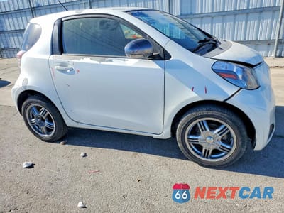 Czwarte zdjęcie samochodu z boku: 2013 SCION IQ BASE VIN:JTNJJXB05DJ024314 - miniatura