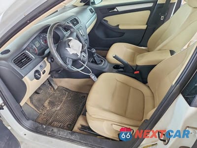 Zdjęcie 7 z 12 samochodu: 2012 VOLKSWAGEN JETTA TDI VIN:3VW3L7AJ8CM090517 - miniatura