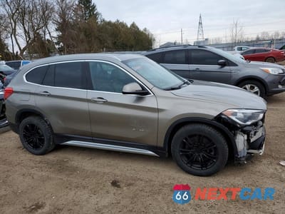 Czwarte zdjęcie samochodu z boku: 2018 BMW X1 XDRIVE28I VIN:WBXHT3C31J5K23222 - miniatura