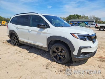 Czwarte zdjęcie samochodu z boku: 2022 HONDA PILOT TRAILSPORT VIN:5FNYF6H80NB057001 - miniatura