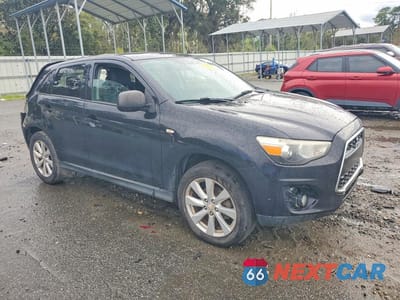 Czwarte zdjęcie samochodu z boku: 2014 MITSUBISHI OUTLANDER SPORT ES VIN:4A4AP3AU8EE028084 - miniatura