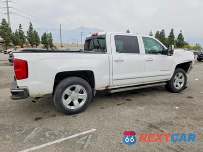 Trzecie zdjęcie samochodu z tyłu: 2017 CHEVROLET SILVERADO C1500 LTZ VIN:3GCPCSEC3HG124694 - miniatura