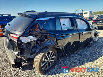 Trzecie zdjęcie samochodu z tyłu: 2023 TOYOTA COROLLA CROSS XLE VIN:7MUEAAAG0PV063343 - miniatura