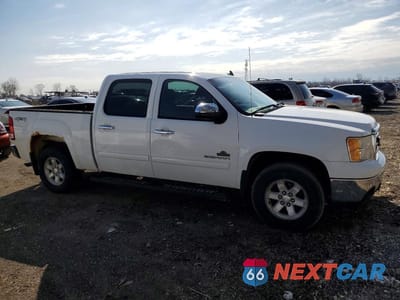 Czwarte zdjęcie samochodu z boku: 2012 GMC SIERRA K1500 SLE VIN:3GTP2VE70CG112129 - miniatura