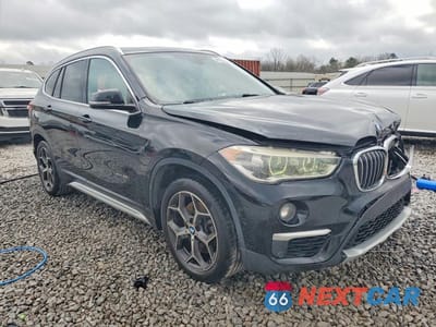 Czwarte zdjęcie samochodu z boku: 2017 BMW X1 XDRIVE28I VIN:WBXHT3Z37H4A65107 - miniatura