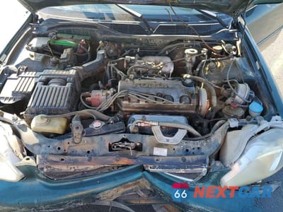 Zdjęcie 11 z 12 samochodu: 1999 HONDA CIVIC EX VIN:2HGEJ8542XH535299 - miniatura