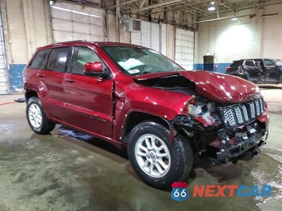 Czwarte zdjęcie samochodu z boku: 2021 JEEP GRAND CHEROKEE LAREDO VIN:1C4RJEAG0MC719329 - miniatura