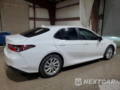 Trzecie zdjęcie samochodu z tyłu: 2023 TOYOTA CAMRY LE VIN:4T1C11AK9PU752343 - miniatura