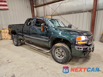 Czwarte zdjęcie samochodu z boku: 2004 GMC SIERRA K2500 HEAVY DUTY VIN:1GTHK29G04E372312 - miniatura