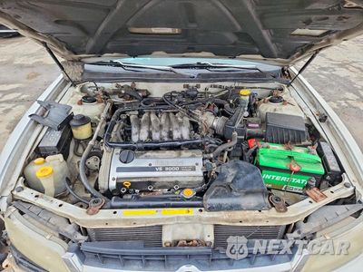 Zdjęcie 11 z 11 samochodu: 1998 NISSAN MAXIMA SE VIN:JN1CA21A8WT303275 - miniatura