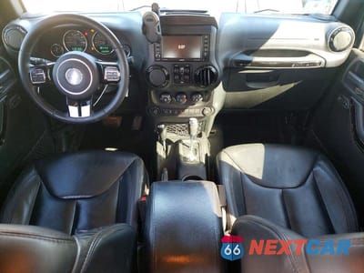 Zdjęcie 8 z 13 samochodu: 2015 JEEP WRANGLER UNLIMITED SAHARA VIN:1C4BJWEGXFL663789 - miniatura
