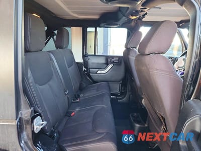 Zdjęcie 10 z 11 samochodu: 2014 JEEP WRANGLER UNLIMITED SAHARA VIN:1C4BJWEG1EL175250 - miniatura