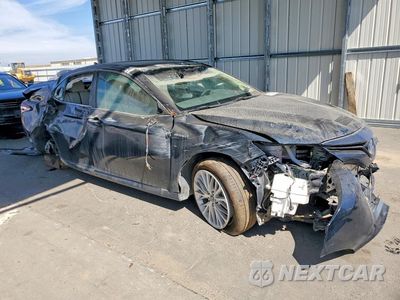 Czwarte zdjęcie samochodu z boku: 2018 TOYOTA CAMRY HYBRID XLE VIN:4T1B21HKXJU507511 - miniatura